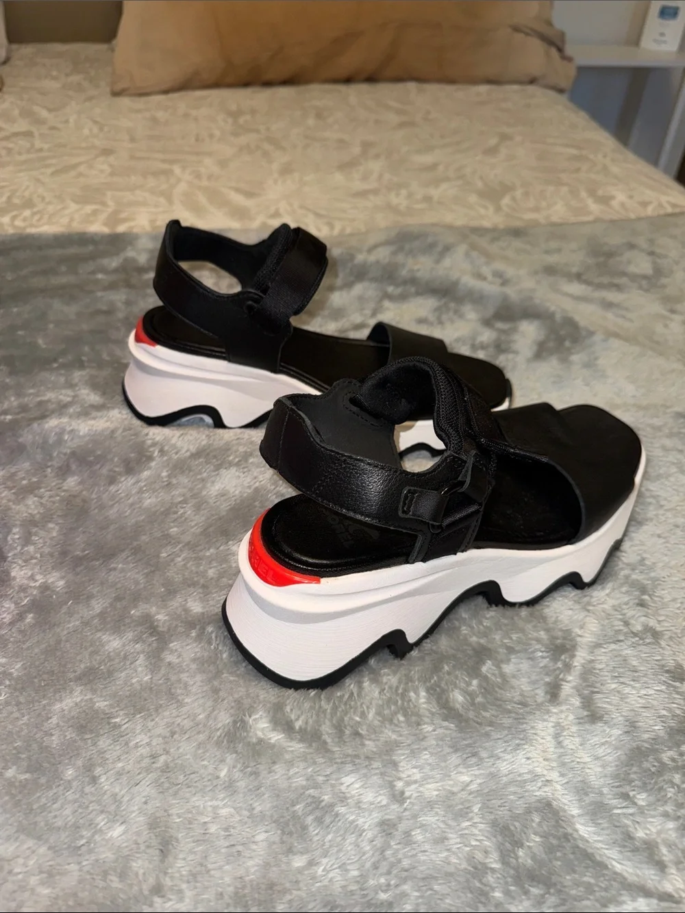 Sorel Black Platform Sandals with White Sole and Red Accent